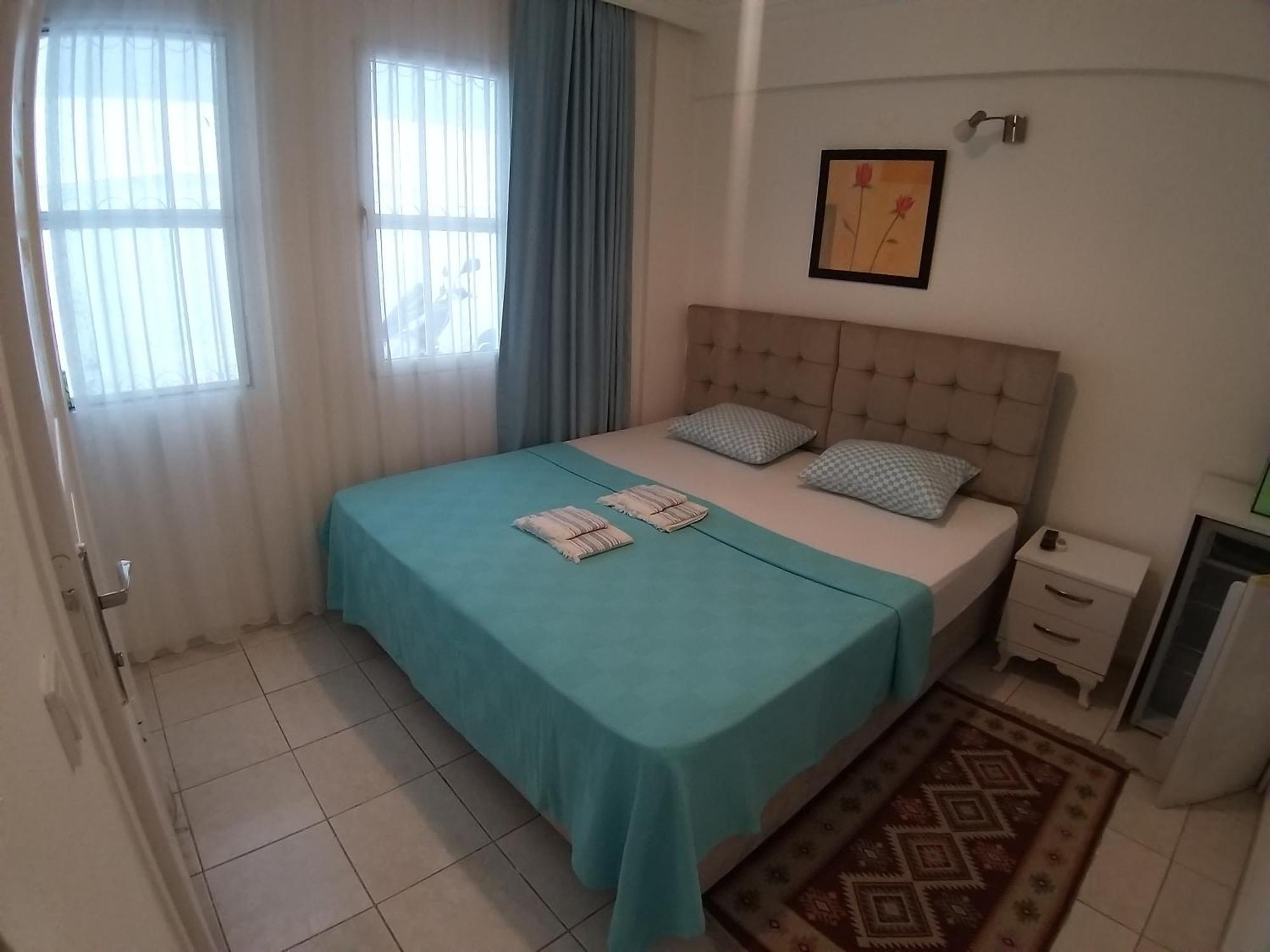 Beyaz Apart Pansiyon Кешме Экстерьер фото
