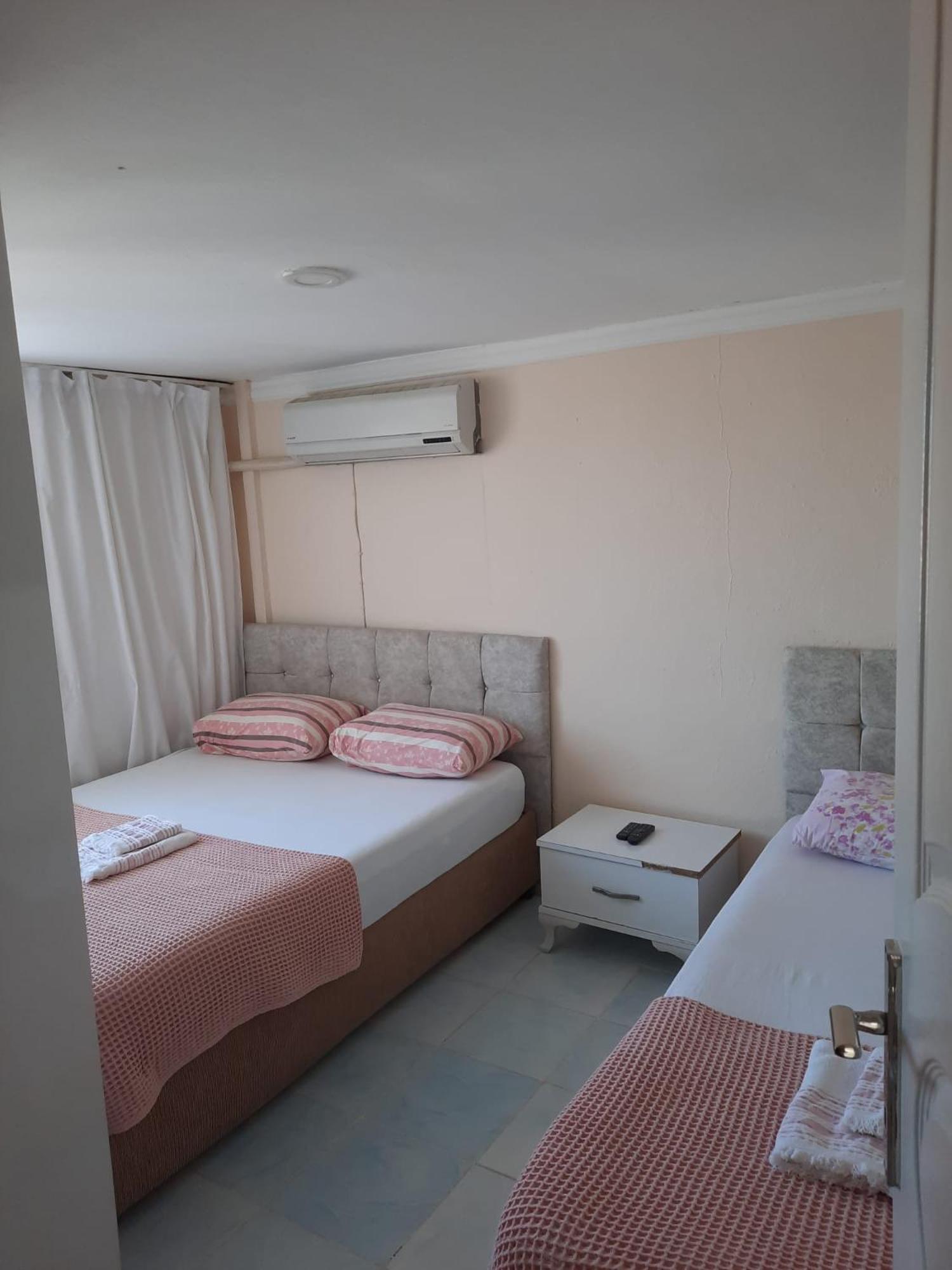 Beyaz Apart Pansiyon Кешме Экстерьер фото