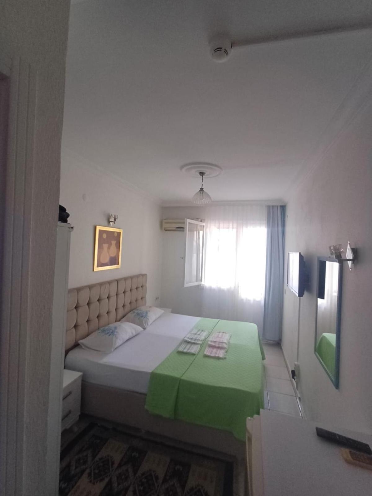 Beyaz Apart Pansiyon Кешме Экстерьер фото